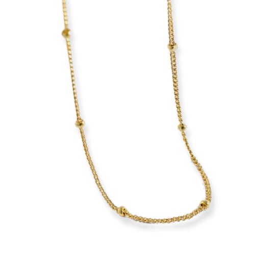 "Eine feine 925 Silber, 18k vergoldete Halskette mit kleinen Kugeln - zeitlos schön und perfekt kombinierbar für jeden Look."